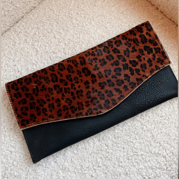 Faux-fur Leopard and black clutch. Perfect for date nights or holiday parties. - Picture 2 of 4